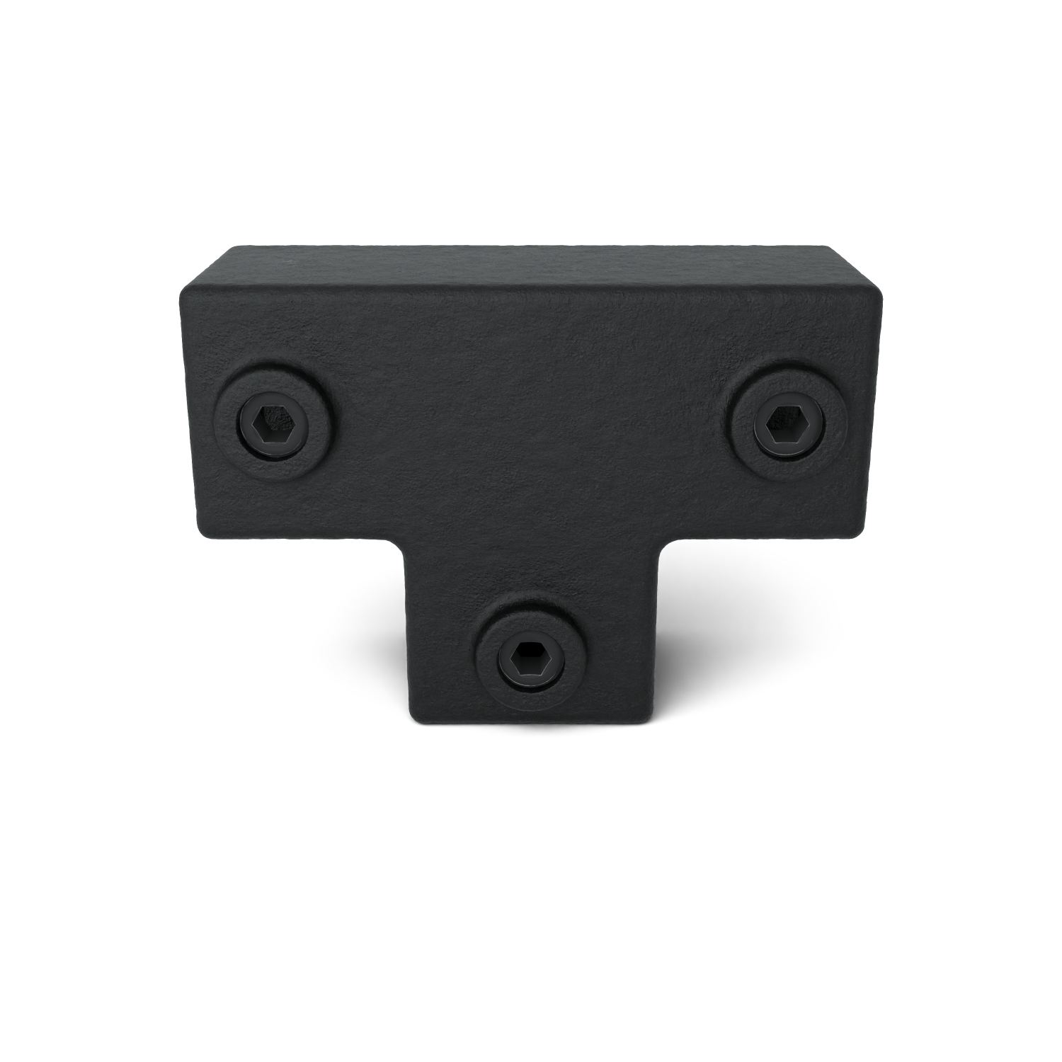 Conector metálico negro en forma de T con superficie rugosa y mate. En los extremos de los brazos horizontal y vertical hay un tornillo Allen empotrado en cada uno, tres en total. Sobre fondo blanco con una ligera sombra.